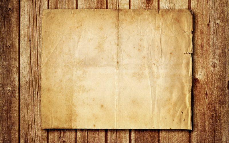 background lịch sử giấy trên nền gỗ